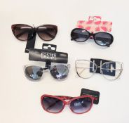 A collection of Women's sunglasses (New with tags) From Revlon, Papaya and Foster grants.