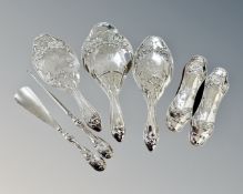A Edwardian seven-piece silver dressing table set comprising of two pairs of brushes, hand mirror,