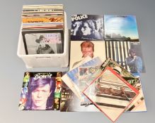 A collection of sixty three vinyl LP records : Family, Bad Company, Dire Straits, Free,