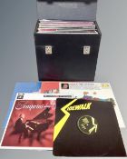 A case of vinyl LP's including Genesis, The Who, The Christians, Ultravox, Lindisfarne,