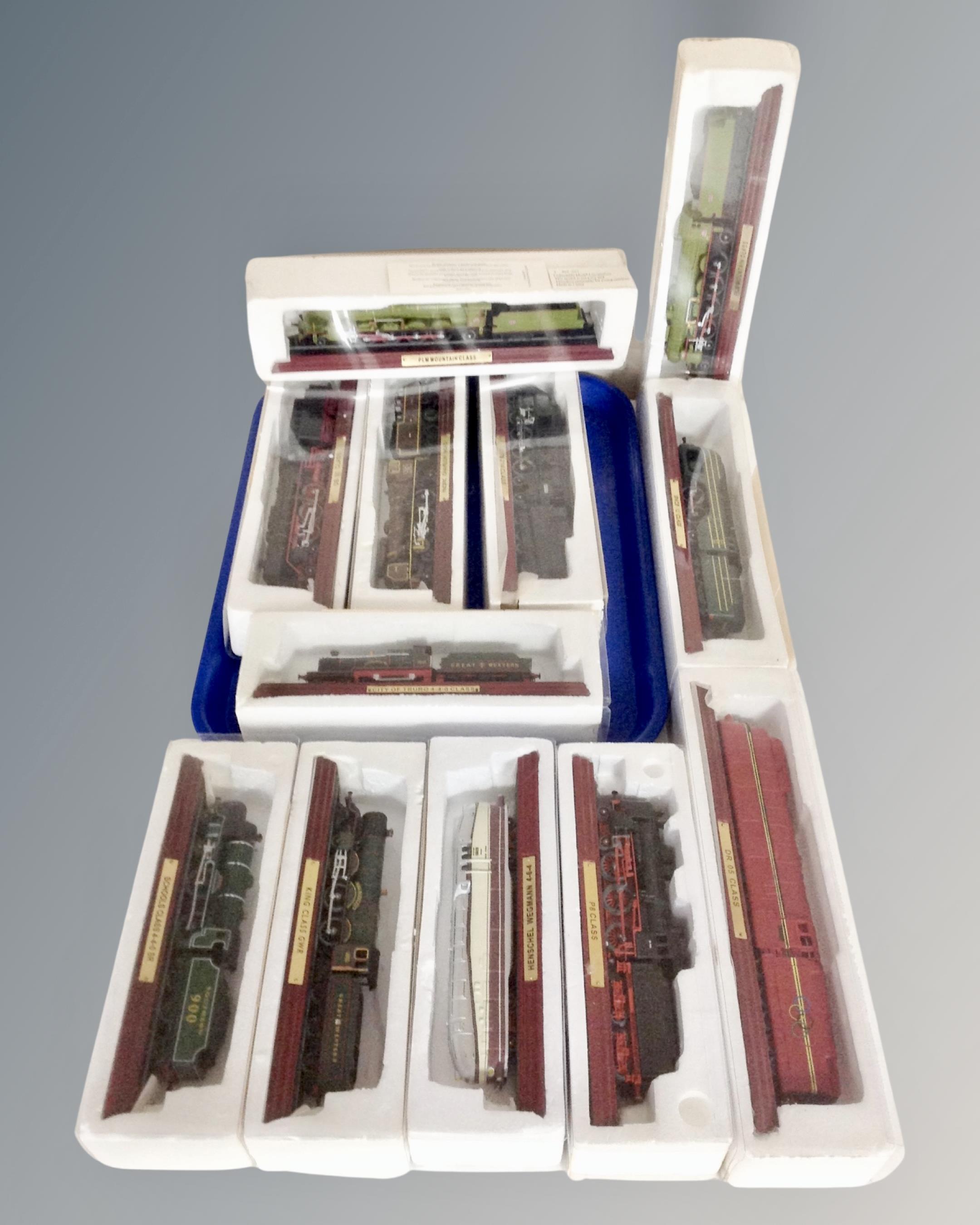 A tray of twelve die-cast locomotives