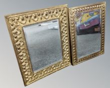 Two vintage brass embossed framed mirrors