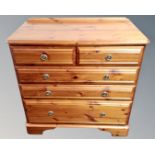 A Ducal pine five drawer chest