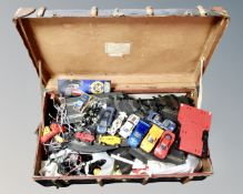 A 20th century bentwood bound trunk containing a large quantity Scalextric items,