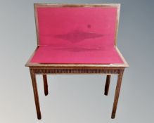 A 19th century turnover top card table
