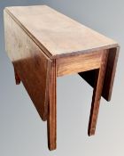 A 19th century flap sided gate leg table
