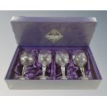 A set of four Edinburgh crystal wine glasses, boxed.