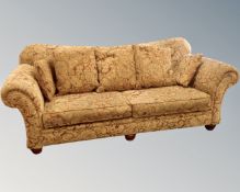 A Duresta three seater settee in Paisley fabric,