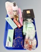 A tray of products and perfumes including Lancome, Byzance eau de toilette,