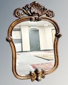 A 19th century rosewood cartouche-shaped mirror, 84 cm x 60 cm.