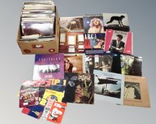 A box of vinyl LP's and 7 inch singles, 80's and Rock, Paul Young, Kate Bush, Thompson twins,