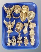 A tray of brass door knockers