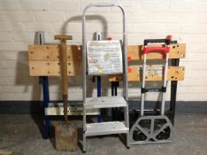 Two folding work benches together with a garden spade,