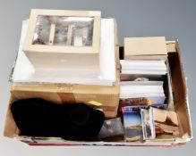 A box containing jewellery stands, quantity of postcards, Northumberland coast greetings cards,