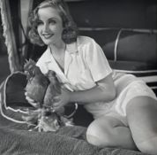 Vintage 1936 Nitrate negative of Carole Lombard with a rooster, then fiance of Clark Gable,