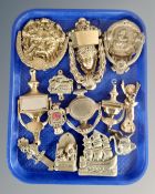 A tray of brass door knockers