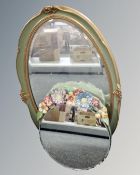 A green and gilt oval framed bevelled mirror together with a Barbola dressing table mirror (Af)