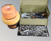 An Lyman turbo twin tumbler together with a metal tool box containing socket sets,