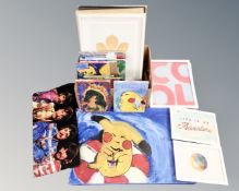A box of assorted pictures, wall canvases, contemporary oils on canvas, Pokemon characters,