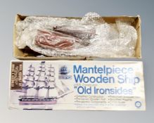 An Entx mantel piece wooden ship of the USS Constitution 'Old Iron Sides', boxed.