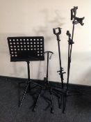 Five assorted music and guitar stands