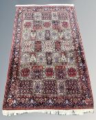 A Ghom rug, central Iran, of compartmentalised design,