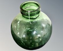 A globular green glass vessel, height 33 cm.