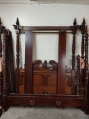 Two reproduction four-poster bed frames (damaged/incomplete,