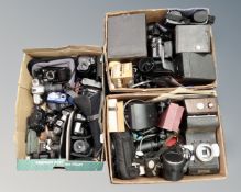 Three boxes of vintage and later cameras, accessories, projectors,