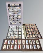 A box of cigarette cards in albums, card collectors society cards in file,