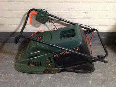 A Black and Decker hover master 12 inch cut electric lawn mower with grass box and lead