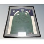 A London Irish rugby shirt bearing signatures in frame