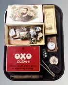 A tray of cigar box and Oxo tin, HMV gramophone needle boxes, American pocket watch,