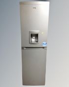 A Beko frost free upright fridge freezer with water dispenser