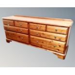 A Ducal pine eight drawer block chest