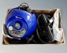 A Polti Vaporetto 2300 steam cleaner with hose and accessories