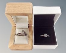 Two Pandora rings in wood box together with a further Pandora ring in original box