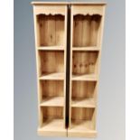 A pair of narrow pine open bookshelves, each 37 cm x 24 cm x 152 cm.