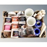 A box of new mugs, tea light holders, vases, kitchen storage jars,