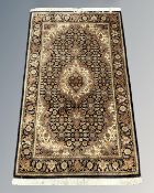 A Tabriz design rug,