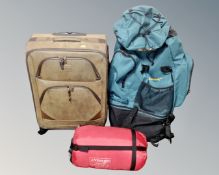 A Regatta Survivor 85 rucksack together with a Vango 300 sleeping bag in carry bag and luggage case