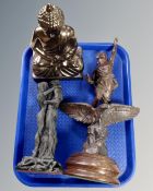 A spelter figure of a man riding an eagle on wooden plinth together with two further contemporary