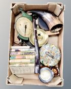A box of Salter scales, Biggles books, cow horn, folding rule,