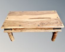 A Sheesham wood coffee table