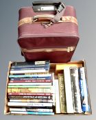 A box containing hardback books including reference, Royalty, Guinness book of records,
