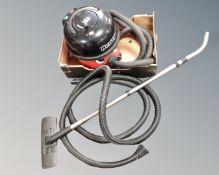 A Henry pneumatic vacuum cleaner with two hoses and attachments