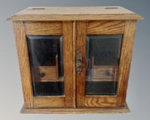 An oak smoker's cabinet