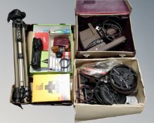 A case and two boxes of vintage projectors, reels, camera tripod, Kodak movie camera,