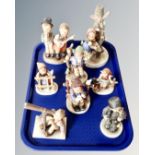 A tray of six Goebel figures together with a lamp base and further similar figure (8)