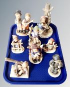 A tray of six Goebel figures together with a lamp base and further similar figure (8)